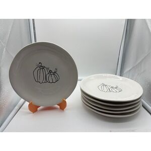 Pier 1 Imports stoneware dessert plates with a black and white pumpkin pattern.